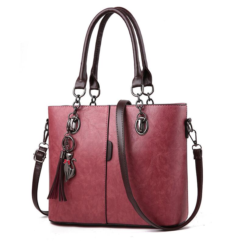 Yogodlns mujer de invierno bolsos de mano de cuero de color con borla y borla colgante de gato: Dark pink