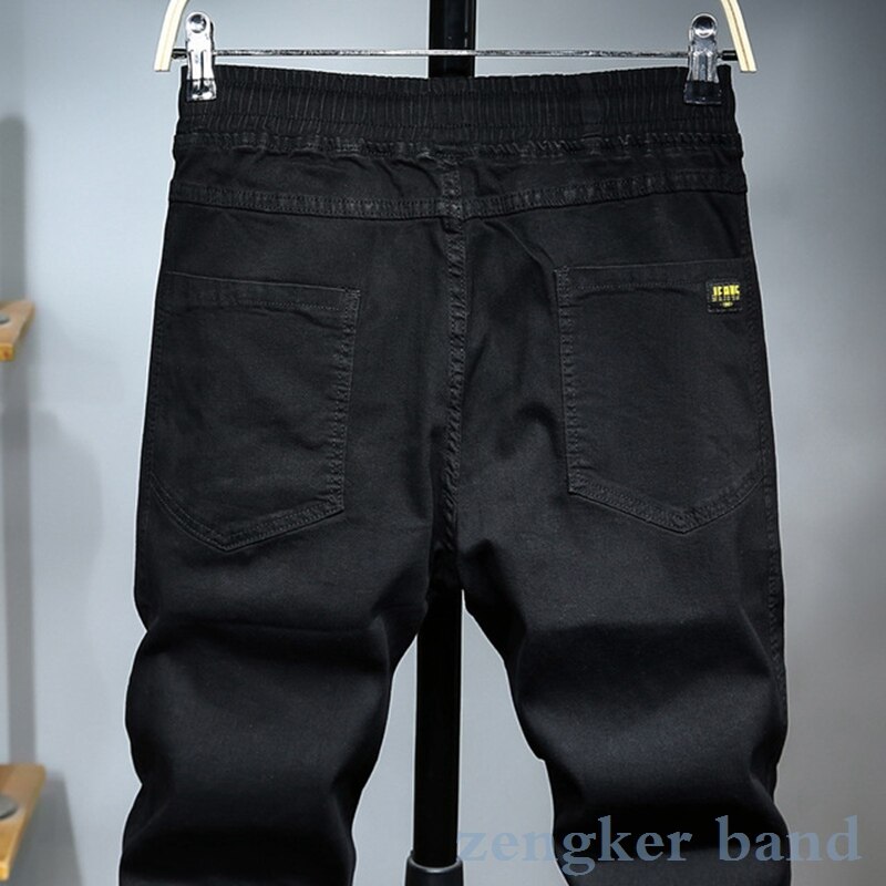Fjederjeans med elastik i taljen til mænd og #39 ;s store størrelse løse haremsbukser tidevand oversized elastik slim cropped ankellange bukser 6xl 5xl 4xl