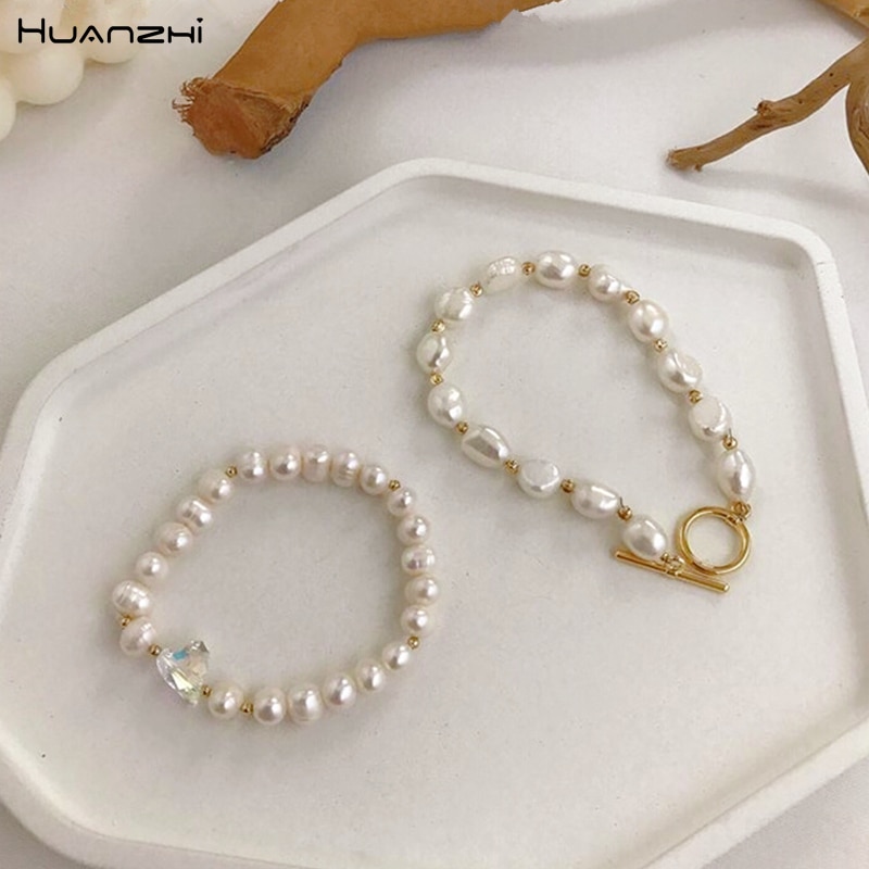 HUANZHI coreano redondo hebilla en forma de corazón Natural perla chapada en oro pulseras para mujeres niñas de joyería de