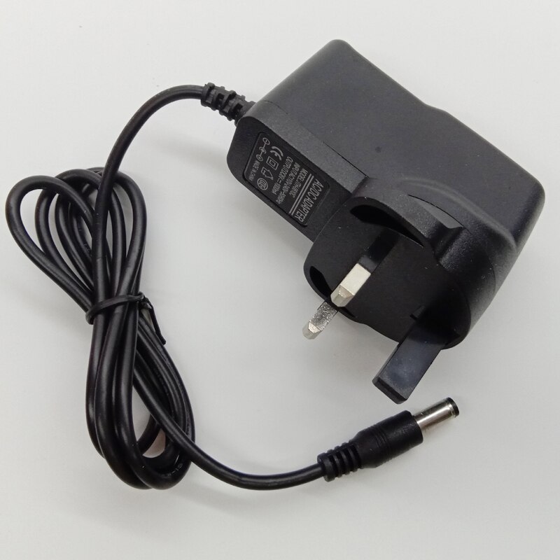 Paras universaali  ac 100-240v us eu uk au pistoke  dc 12v 600ma virtalähdesovitin 5.5mm*2.5mm yleisvirtasovitin