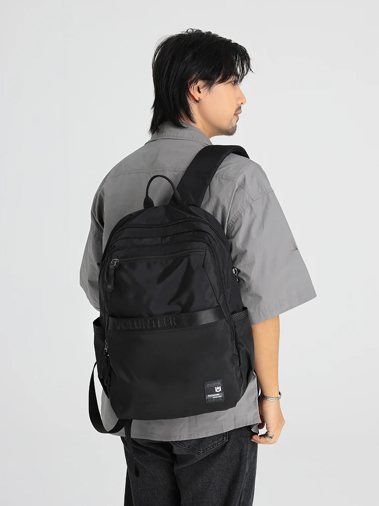 Zaino volontario per uomo 2023 Nuovo pendolare da viaggio casuale Solido di grande capacità Multi-tasca Borsa da uomo impermeabile per esterni 1807-01