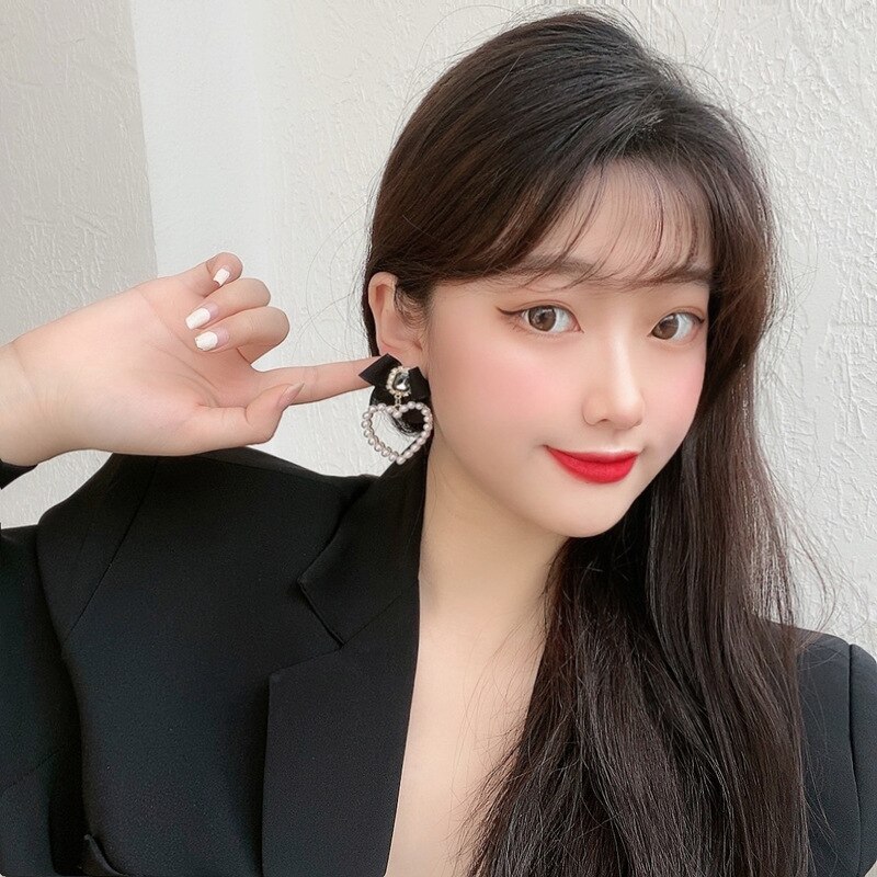 Temperamento coreano orecchini a Clip con fiocco in strass retrò BowKnot nero perle a forma di cuore Clip su orecchini senza foro per la festa delle donne