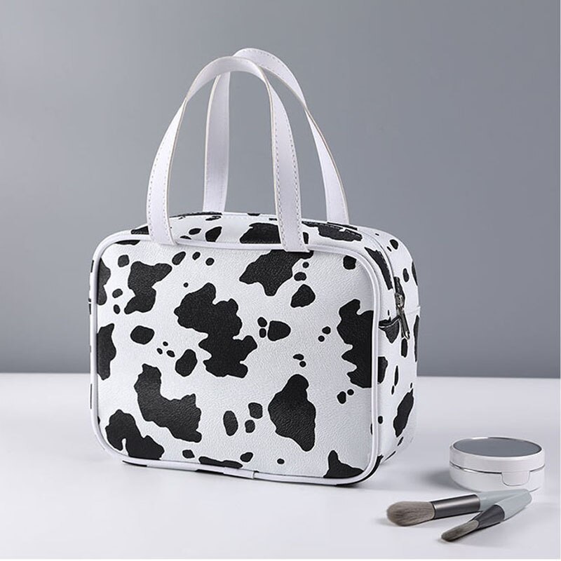 Borsa cosmetica portatile da donna in mucca PU articoli da toeletta impermeabili multifunzione organizzare borse da viaggio per trucco femminile
