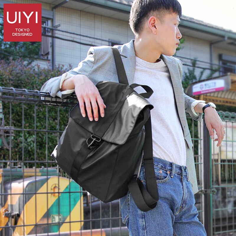 UIYI mochila dos homens Coreano couro PU + PVC 14 polegada laptop escola mochila grande capacidade à prova d' água anti-roubo bolsa de viagem saco