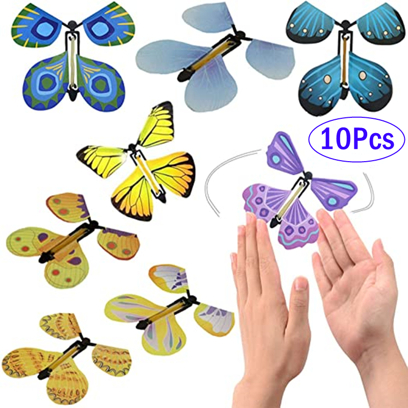 Mariposas voladoras mágicas, juguete de cuerda en el cielo, marcapáginas, tarjetas de felicitación, banda de goma alimentada, accesorios mágicos para niños, sorpresa