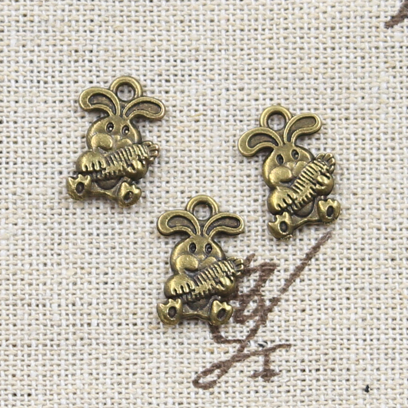 50Pcs Charms Konijn Met Wortel 15X10Mm Antiek Zilver Kleur Hangers Maken Diy Handgemaakte Tibetaans Zilveren sieraden: Antique Bronze Plated