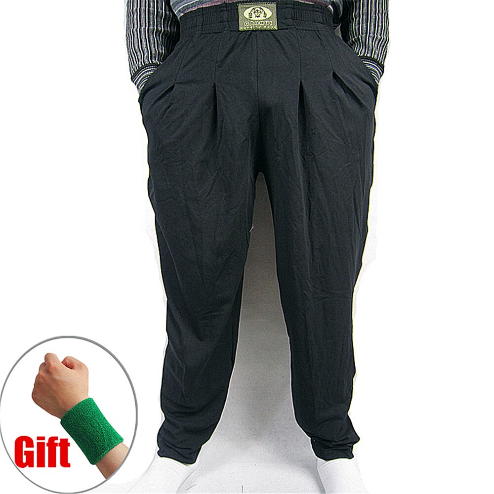 Zimowy trening zdatność spodnie kulturystyka bawełniana koszulka na siłownię odzież na trening sportowy ciepłe spodnie dresowe Crossfit luźne spodnie