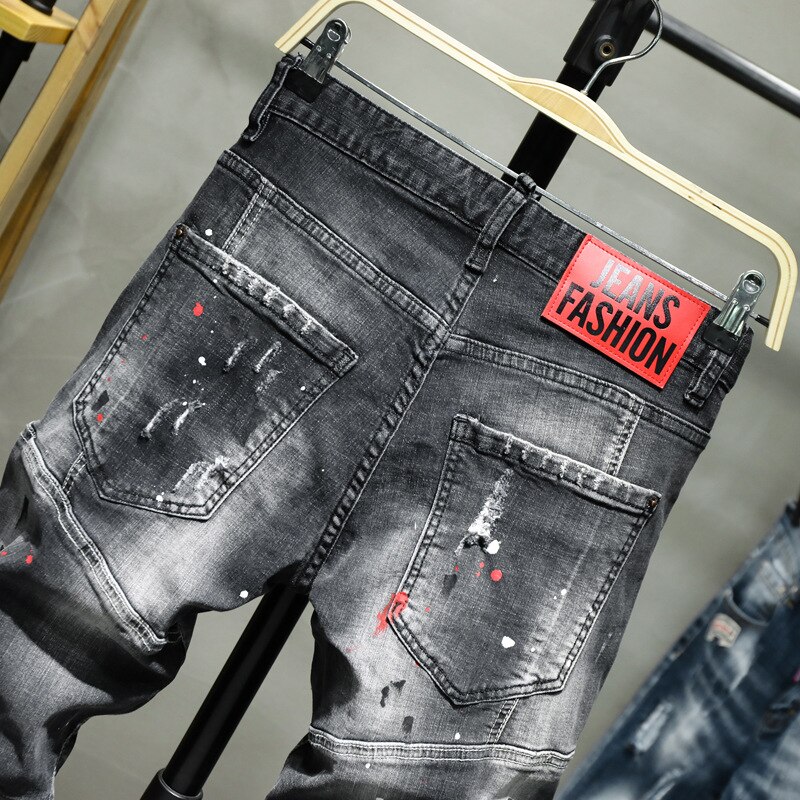 Jean homme trou d'éclaboussure Point de peinture doux coton souple élastique en cuir étiquette noir gris pantalon Slim rouge