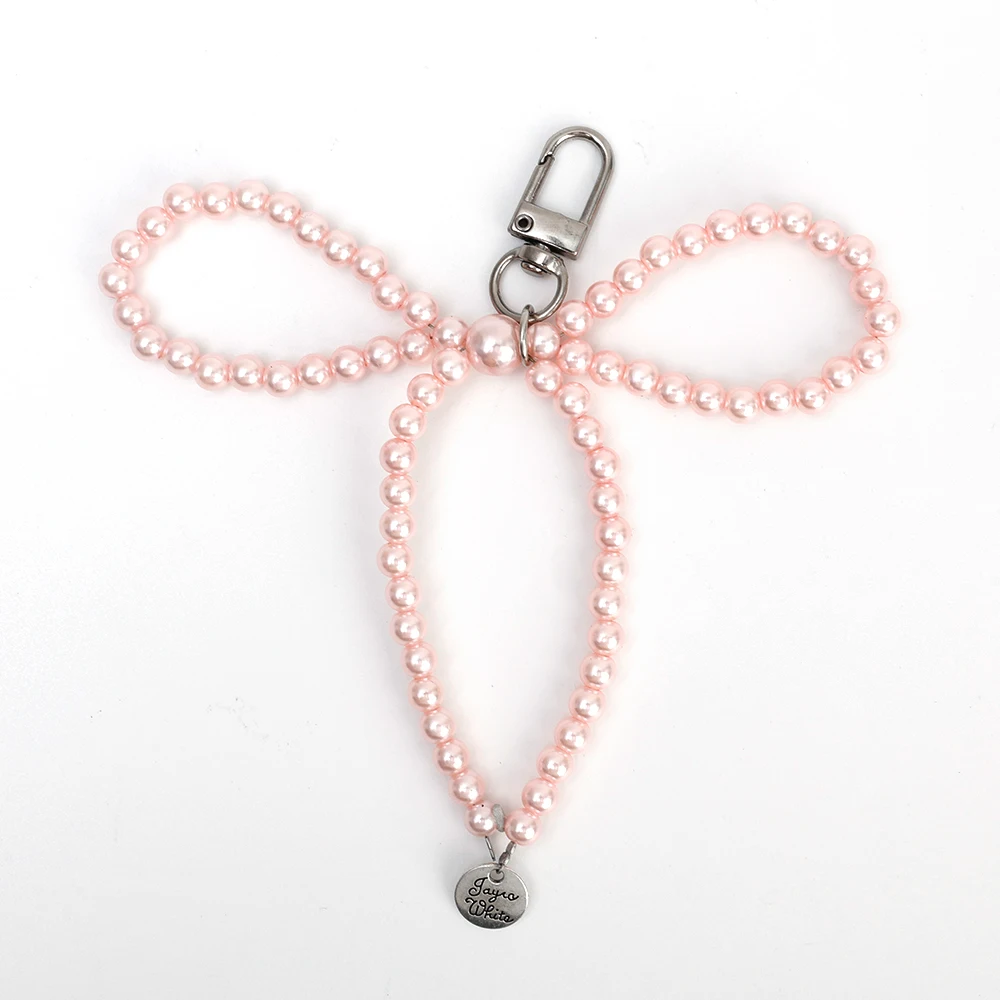 LLavero con forma de corazón y lazo de perlas, mochilas, llavero con forma de corazón con lazo, accesorios colgantes DIY para bolso, teléfonos móviles universales: Amarillo / dorado