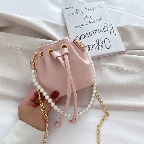 Dames mini emmertas parel handtas pu leer effen kleur ketting schoudertassen kleine schattige dames crossbody handtas: Roze