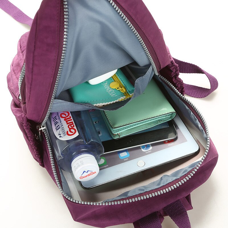 Mochila escolar informal de nailon para mujer, Mochila pequeña e impermeable, bolso de hombro, bolso de mano de capacidad Simple, mochila para chicas