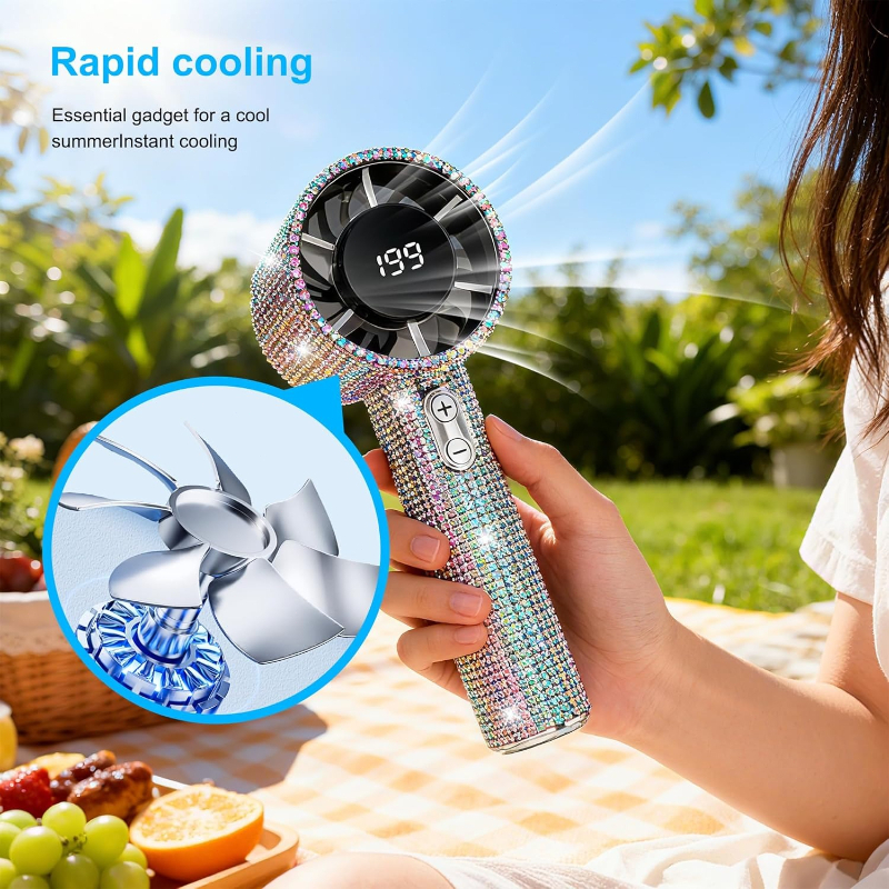 Ein prächtiger und eleganter Handventilator mit großem Akku für eine lange Akkulaufzeit, mit glitzerndem Rand.