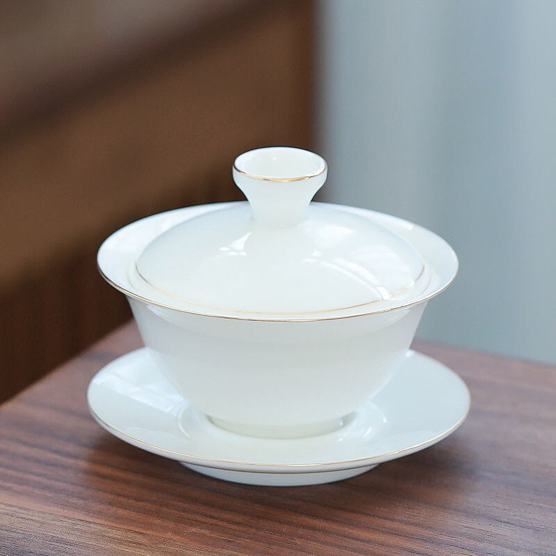 Tueen-cuenco de té de Jade, Taza de cerámica grande con contorno de porcelana blanca en dorado, para infusiones, Kung Fu