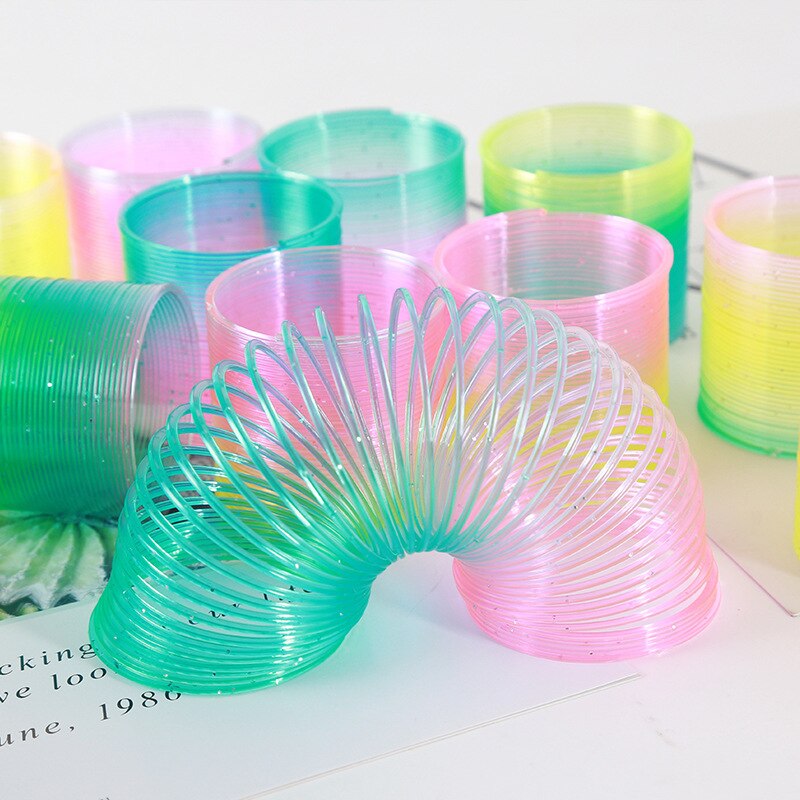 T Kreative Kunststoff Spule Spielzeug Bunte Regenbogen Ring freundlicher Kleine Spielzeug Hersteller Direkt Stall