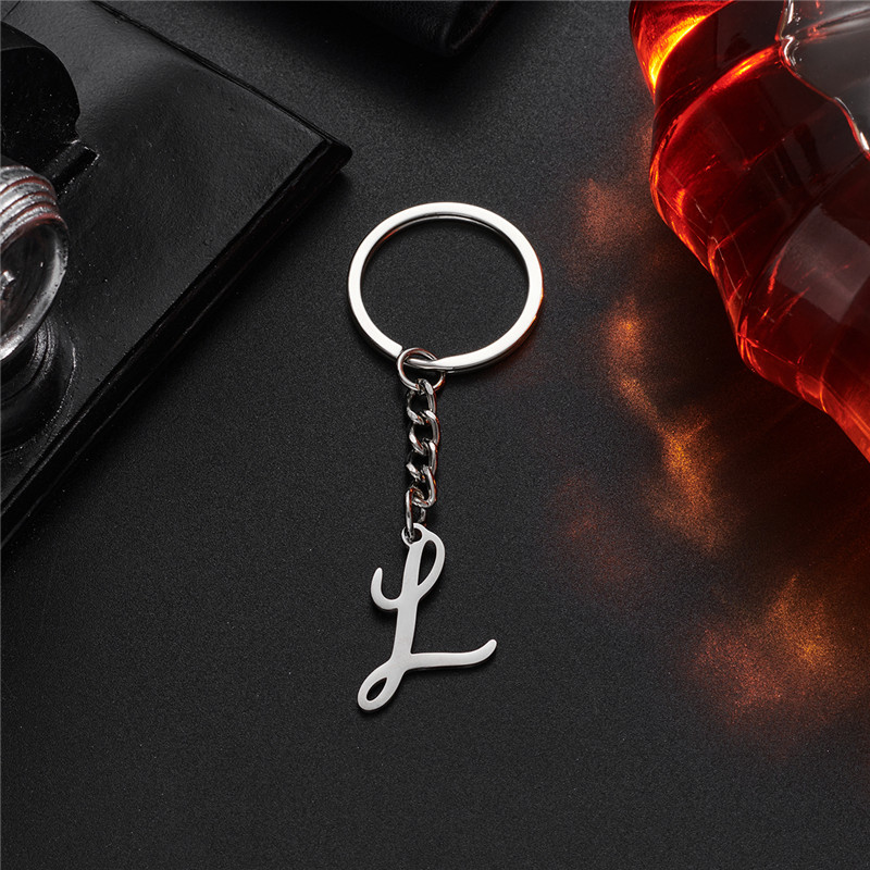 Llavero con letra inicial de A-Z de acero inoxidable para amantes, joyería antigua en inglés, colgante del alfabeto, llavero de coche, accesorios para bolso: Marfíl