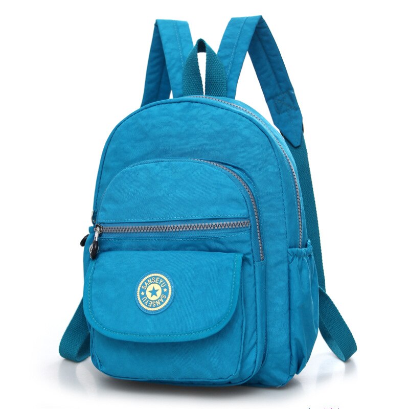 Kvinder nylon skole kvindelig rygsæk lille vandtæt rygsæk solid afslappet skuldertaske multifunktionelle skoletasker: Himmelblå