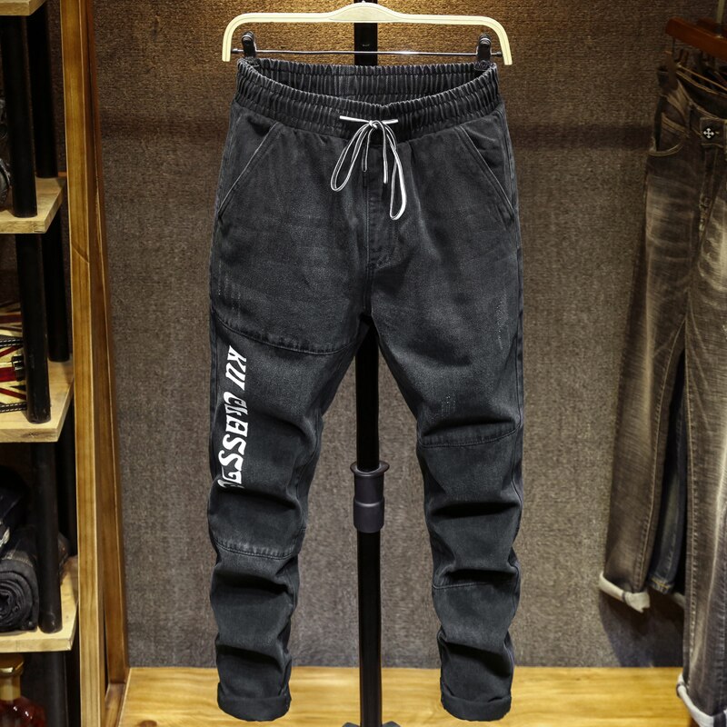 Plus størrelse 5xl 6xl 7xl efterår mænds afslappet harem jeans brevprint sortgrå elastik denimbukser mærkebukser mand: 6xl