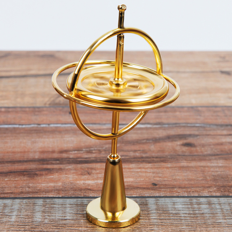 Joylove videnskabelig pædagogisk metal finger gyroskop gyro top tryk lindre klassisk legetøj traditionelt læringslegetøj til børn: Guld