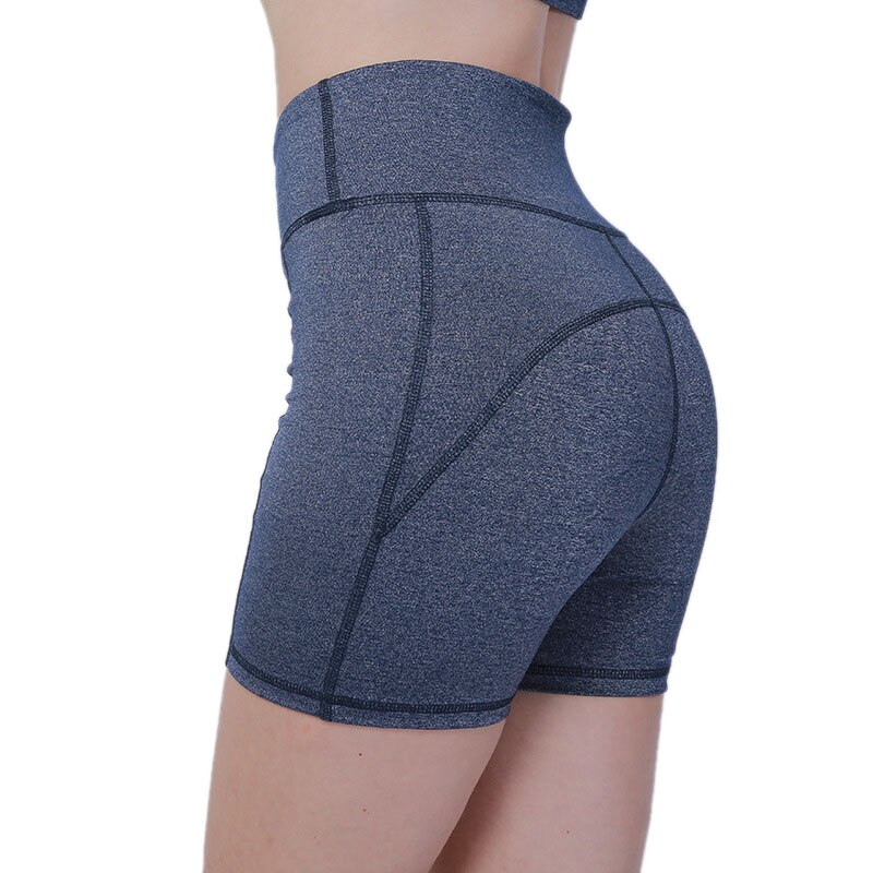 Yogashorts med hög midja för löparbikershorts för kvinnor med fickor