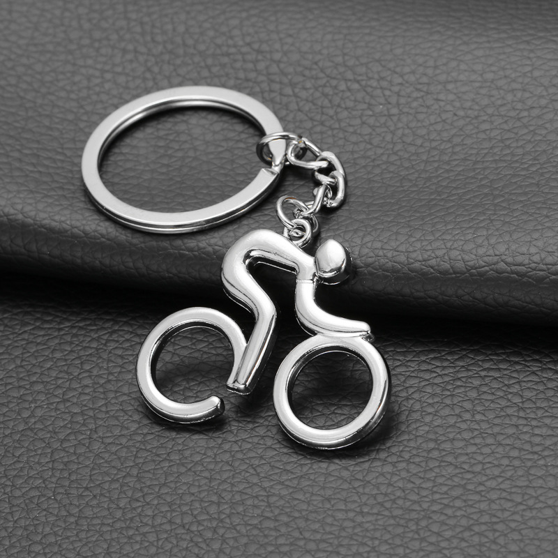 Metal sporty man landevejscykelfigur nøglering nøglering nipsdæk souvenirs til cykelcykel elsker biker: Cykling