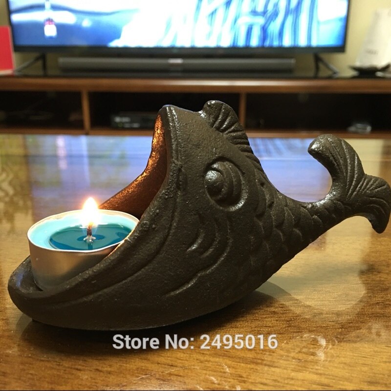 Gietijzeren kaarsenhouder goudvis in bruin of asbak