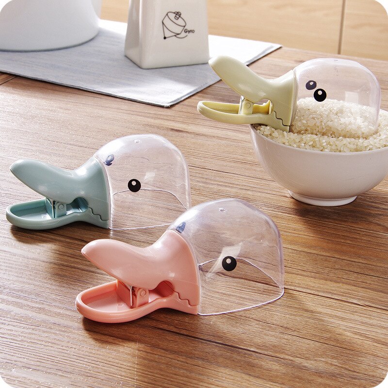 Forma de cabeza de pato creativa con cuchara de arroz transparente de plástico, Clip sellado, Dipper de agua para el hogar, cuchara bonita de pico de pato