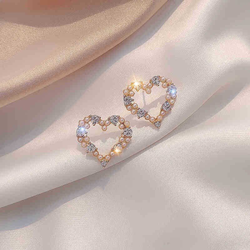 S Needle Korea Irregular Hollow Love Pearl Earrings Compact Joker Love Earrings Female