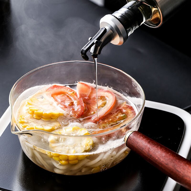 Europæisk stil gennemsigtig kan opvarmes af ildhøj borsilikatglaspotte med træhåndtag mælkegrødsuppe nudlerpotte