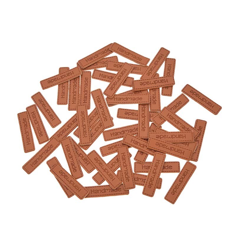 50 Uds. De etiquetas de cuero sintético hechas a mano con patrón de letras, sello en relieve rectangular, para accesorios de costura de prendas de vestir