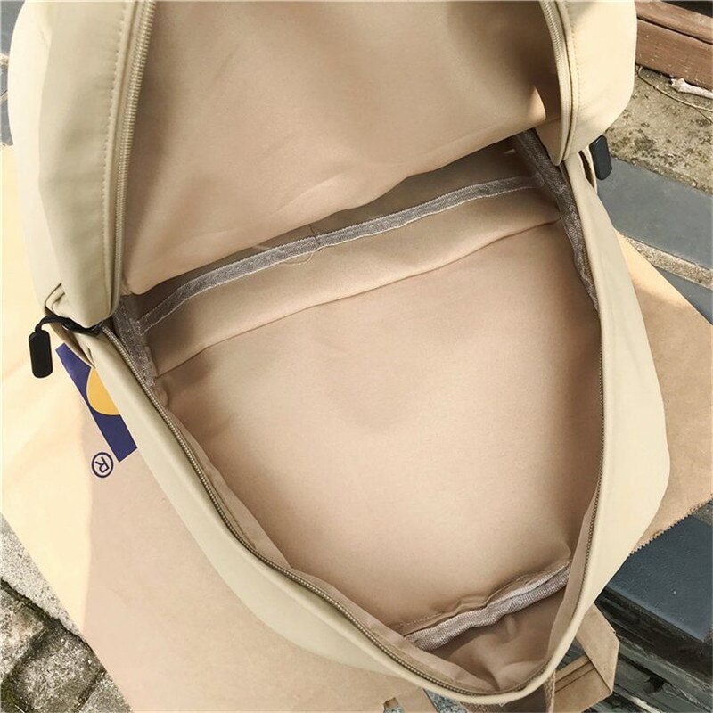 Solid rosa ryggsäck märke unisex fritid eller resväska stor kapacitet färsk skolväska för tonårsflickor över natten