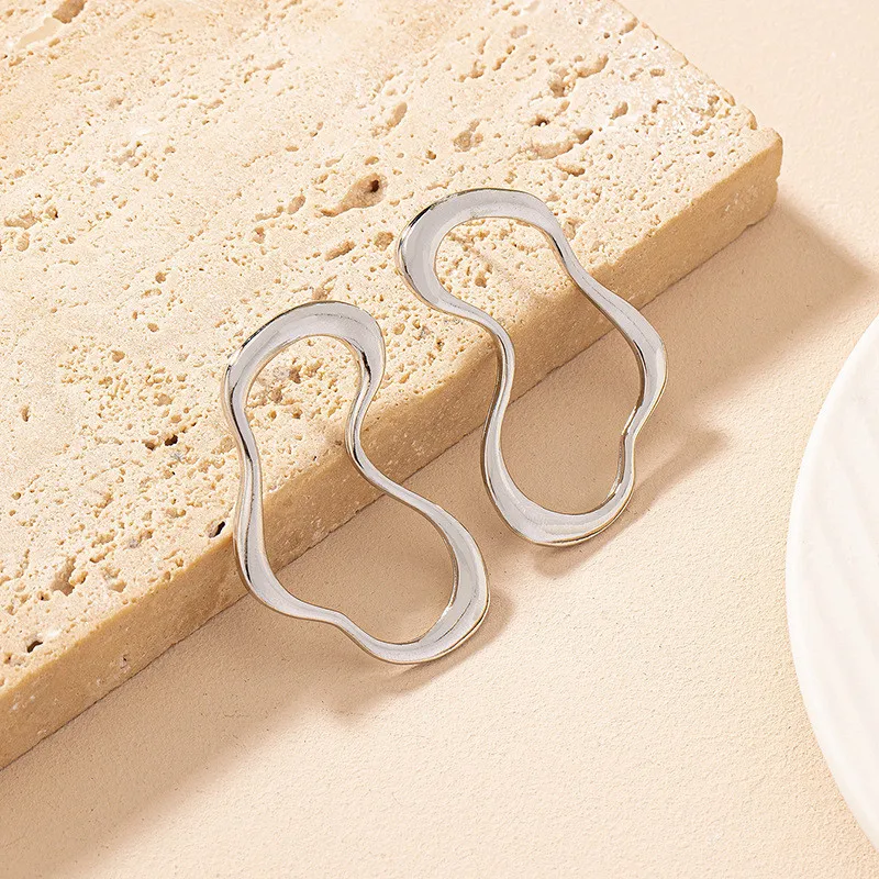 Pendientes creativos de Metal irregulares con forma de gota de agua para mujer, pendientes largos geométricos de Color dorado Vintage, de joyería: Estampado en caliente