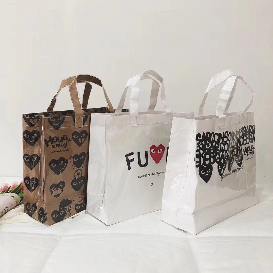 Rei Kawakubo CDG natale in bianco e nero con motivo amore kraft pacchetto di carta borsa parodia borsa shopping in PVC borsa grande Waterp