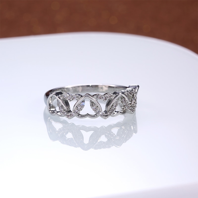 Huitan dobbelt række kors hjerter delikat kvindelig ring cz sten hjerte romantisk bryllup kvinder ringe smykker forlovelsesfest