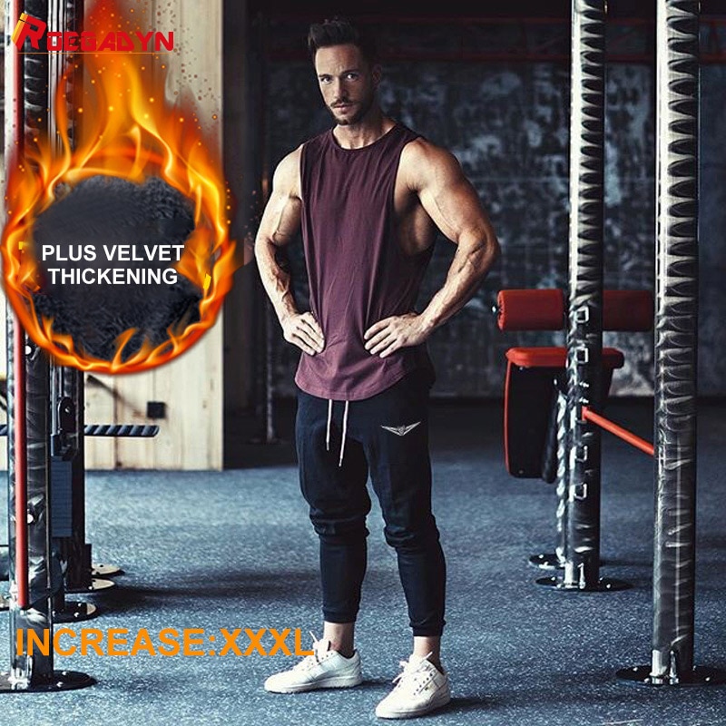 ROEGADYN-Pantalones deportivos de terciopelo para hombre, mallas gruesas para gimnasio, informales, con cierre elástico