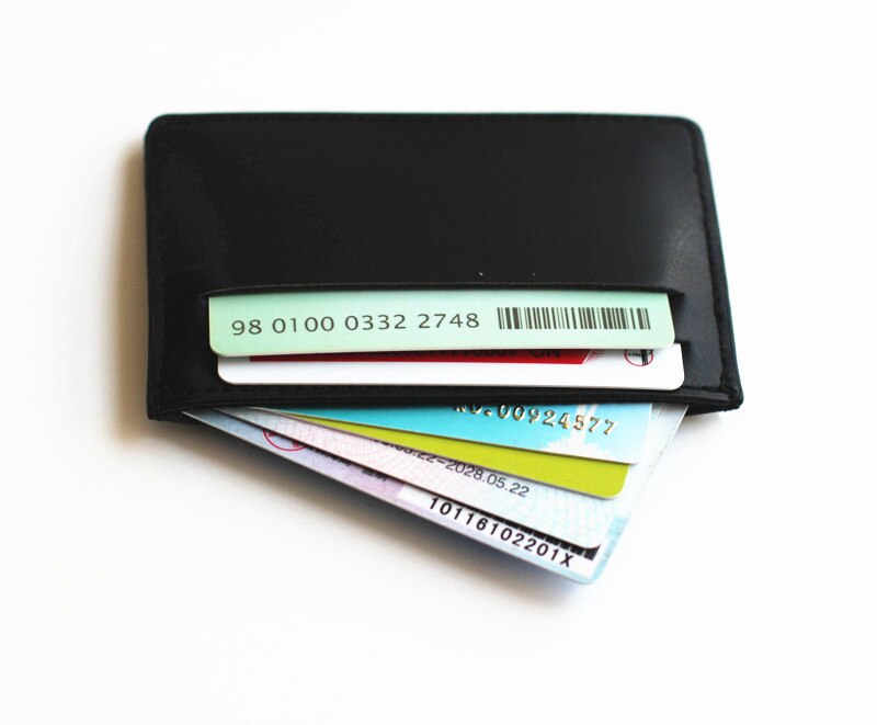 VIP black ultra-thin card holder, leather credit card holder for men and women.