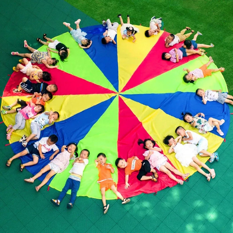 Paraguas de arcoíris para acampar al aire libre para múltiples personas, juguete de paracaídas, saco de salto, juego interactivo de trabajo en equipo, juguete para niños Gif