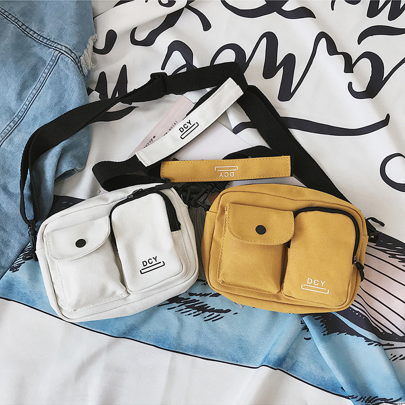 Simple classique toile sacs pour femmes nouveauté femmes moraillon couleur unie de base femme lettres sacoche à fermeture éclair