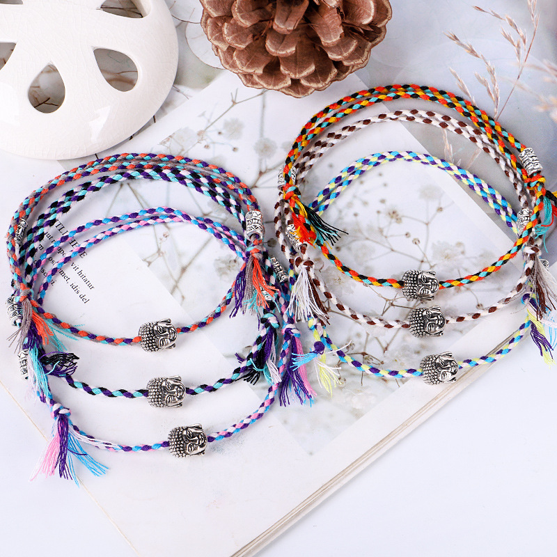 Pulseras y brazaletes de hilo de amuleto tejido con cabeza de Buda tibetana para mujeres y hombres, pulsera de amistad con dije de Buda de cuerda hecha a mano,