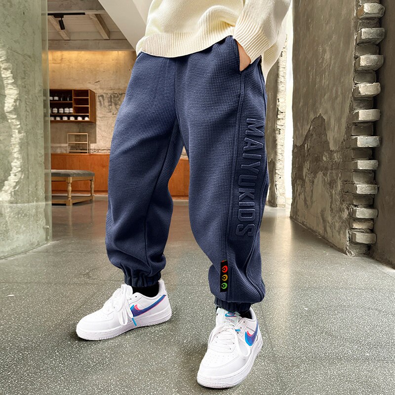 2022 primavera Casual lettera modello pantaloni bambini tinta unita Sport pantaloni lunghi allentati per bambini ragazzi adolescenti 5 6 7 8 9 10 11 12 14 anni