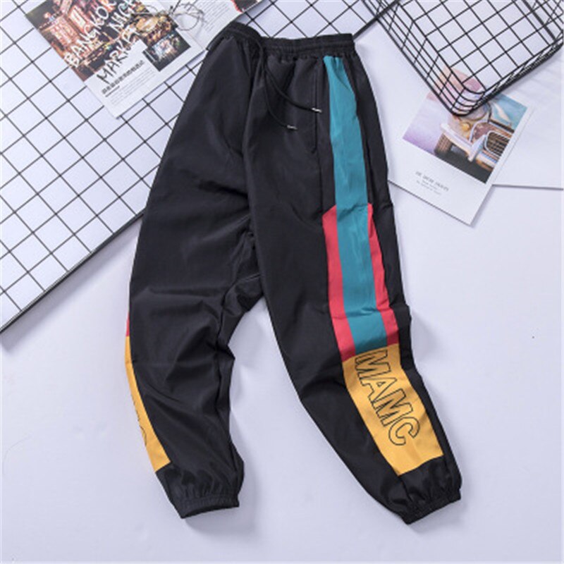 Ropa informal estilo Hip Hop para hombre, pantalones de chándal de empalme, pantalones casuales de para hombre, pantalones Cargo, pantalones de calle alta, pantalones Harem de cintura elástica para hombres