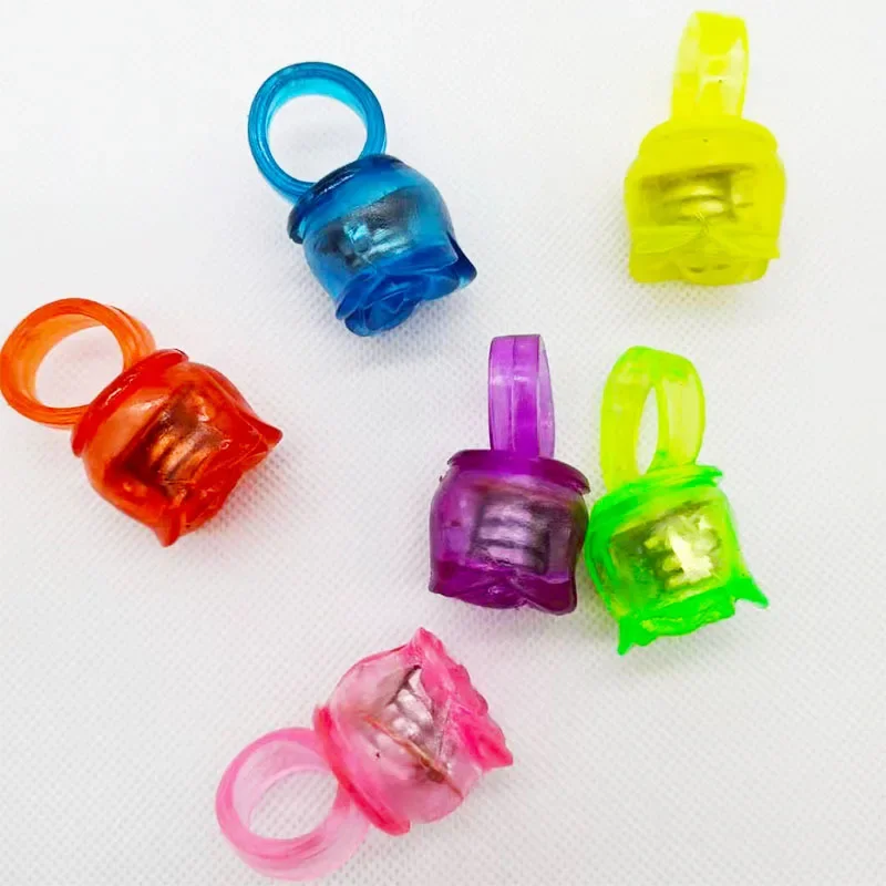 50pcs Light up Rings Bumpy Jelly Rubber Ring Glow Party Favor Finger Lights for Kids Birthday Party Christmas Halloween Festival: Yellow