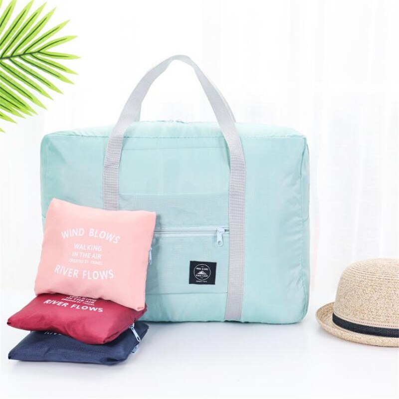 Borsa da viaggio pieghevole in Nylon Unisex borsa impermeabile di grande capacità per bagagli da donna borse da viaggio pieghevoli Organizer cubi da imballaggio