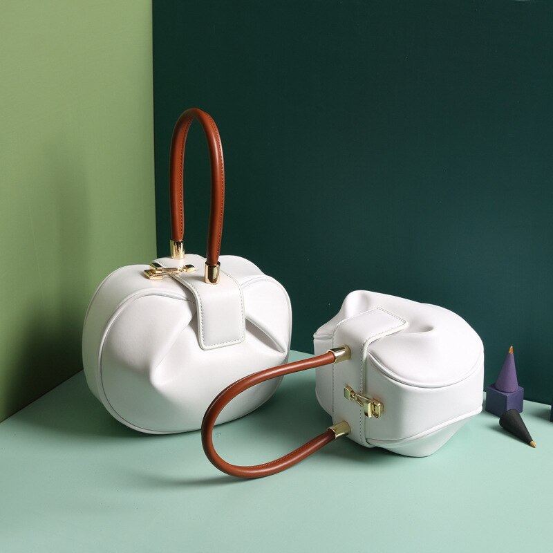 Bag girl leather bag European and American retro niche wonton hand dumpling wonton bag: white small