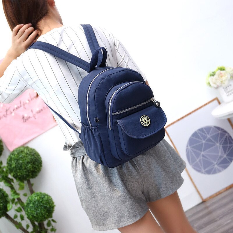 Mochila escolar informal de nailon para mujer, Mochila pequeña e impermeable, bolso de hombro, bolso de mano de capacidad Simple, mochila para chicas