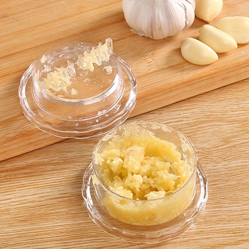 Manueller tragbarer Knoblauchzerkleinerer, rotierendes Küchengerät zum Zerkleinern von Knoblauch und Ingwer, einfach zu bedienen und zu reinigen.