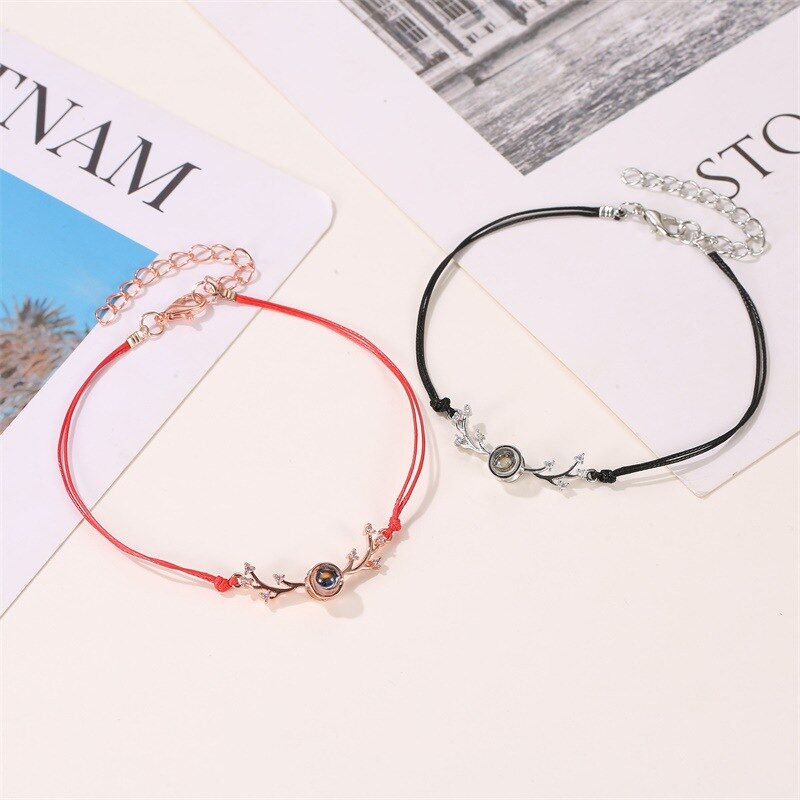 Wereldwijde Explosie EEN Herten heeft u Netto Rode Projectie Paar Antler Armband Creatieve 100 Talen I Love U