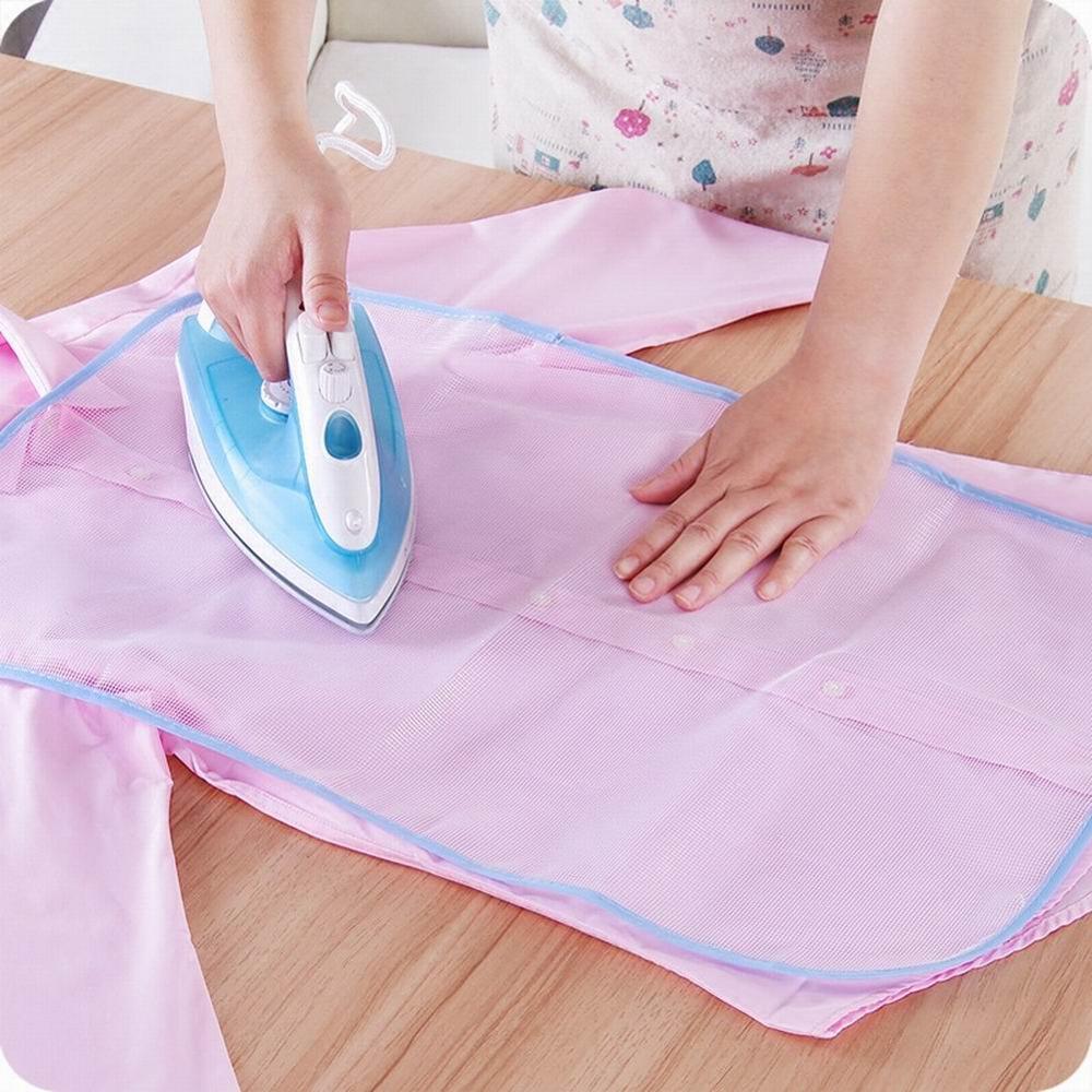 Suojaeriste silityslaudan päällinen satunnaiset värit puristusalustaa vasten silitysliina suojus suojaava puristusverkko