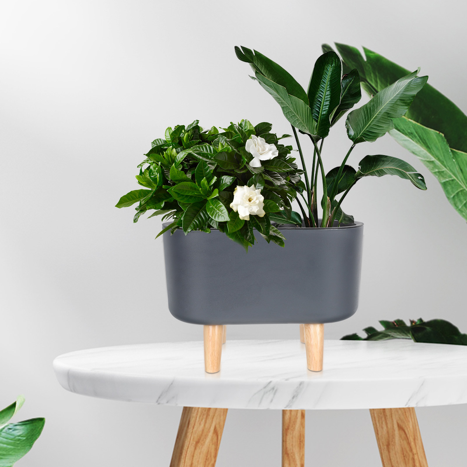 Zelfwaterende bloempot, automatisch absorberende plantenpot, lichtgewicht, duurzame plantenbak van hout en kunststof voor tuin en terras.