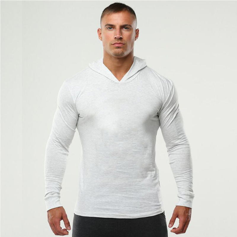 Ropa de gimnasio de Color sólido, camiseta ajustada de manga larga con capucha, Sudadera con capucha transpirable de algodón, ropa deportiva muscular para culturismo y Fitness para hombre