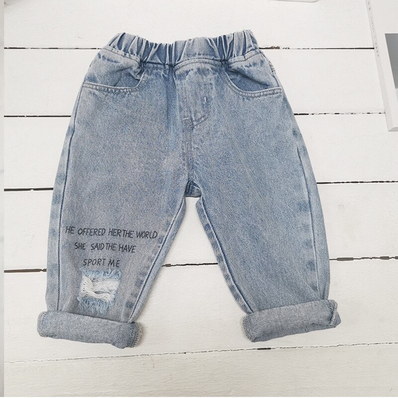 Children's Korean-style ripped jeans letter printed trousers spring and autumn boy pants street trend denim trousers